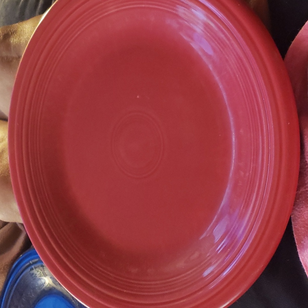 Set of TWO red persimmon FiestaWare dinner plates.